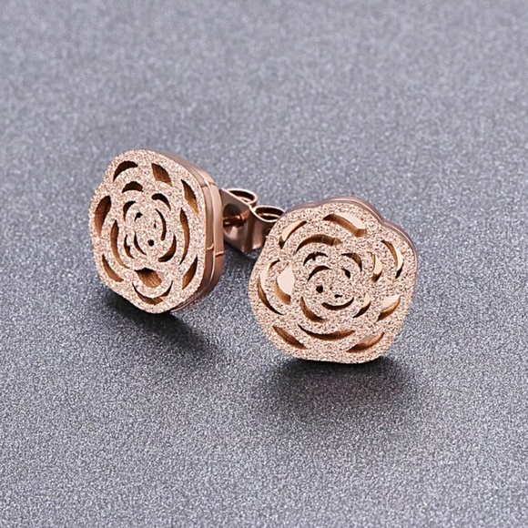 Jewelry - Frosted covered Camellia stud earrings.